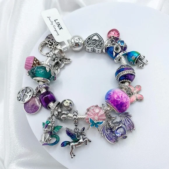 Linx Snake Chain Bracelet with Whimsical Animal Themed Charms